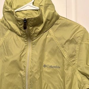 Columbia waterproof neon yellow jacket with built in hoodie. Size L